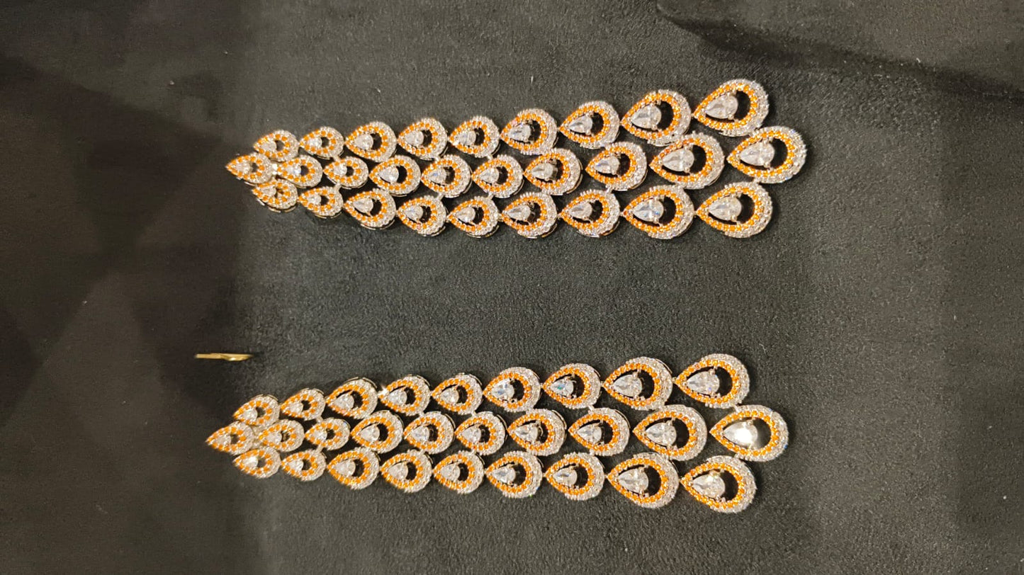 Elegant Teardrop Diamond Earrings with Gold Accents